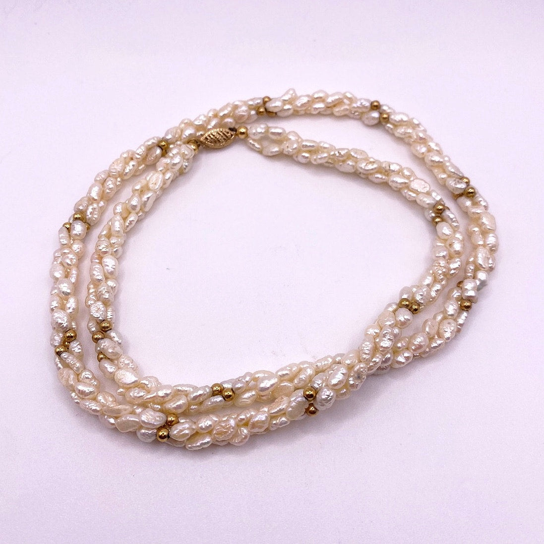 14k and Rice Pearls Necklace 22”  Long