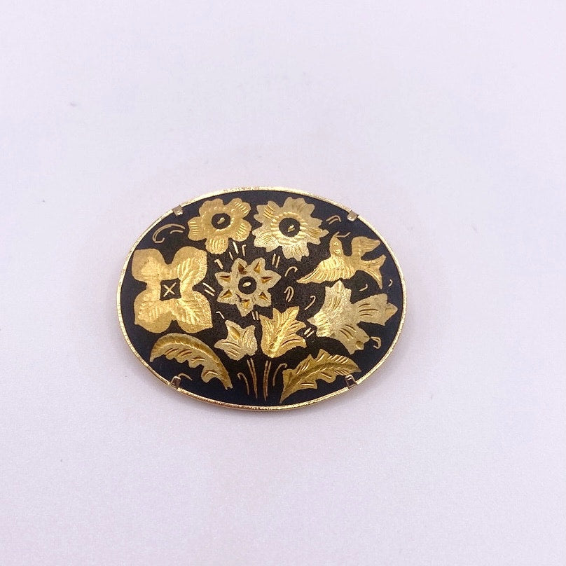 Vintage Damascene Brooch featuring Floral Motifs