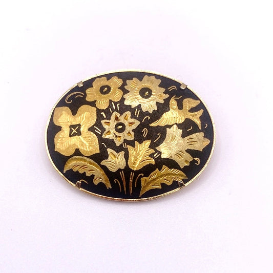 Vintage Damascene Brooch featuring Floral Motifs