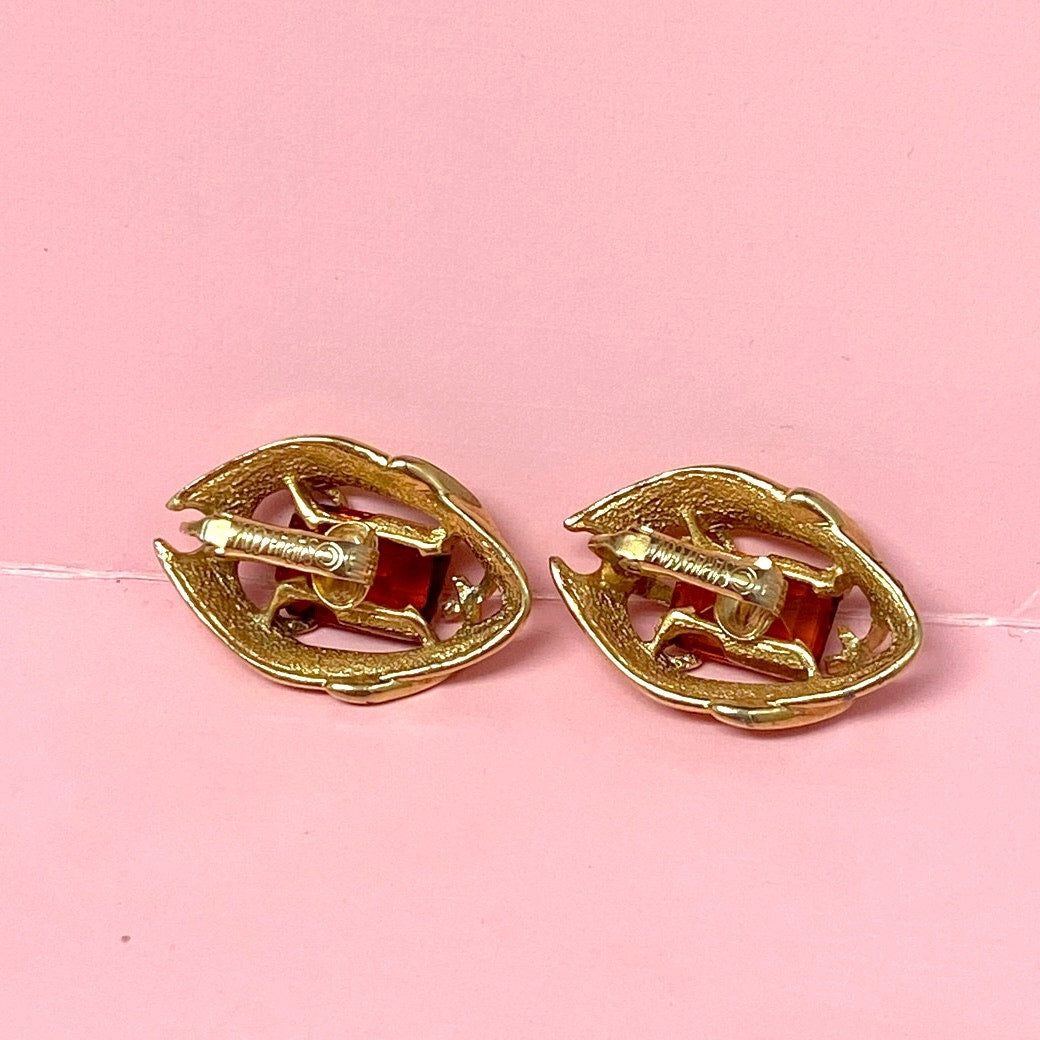 Sarah Coventry Clip On Earrings on Amber Glass