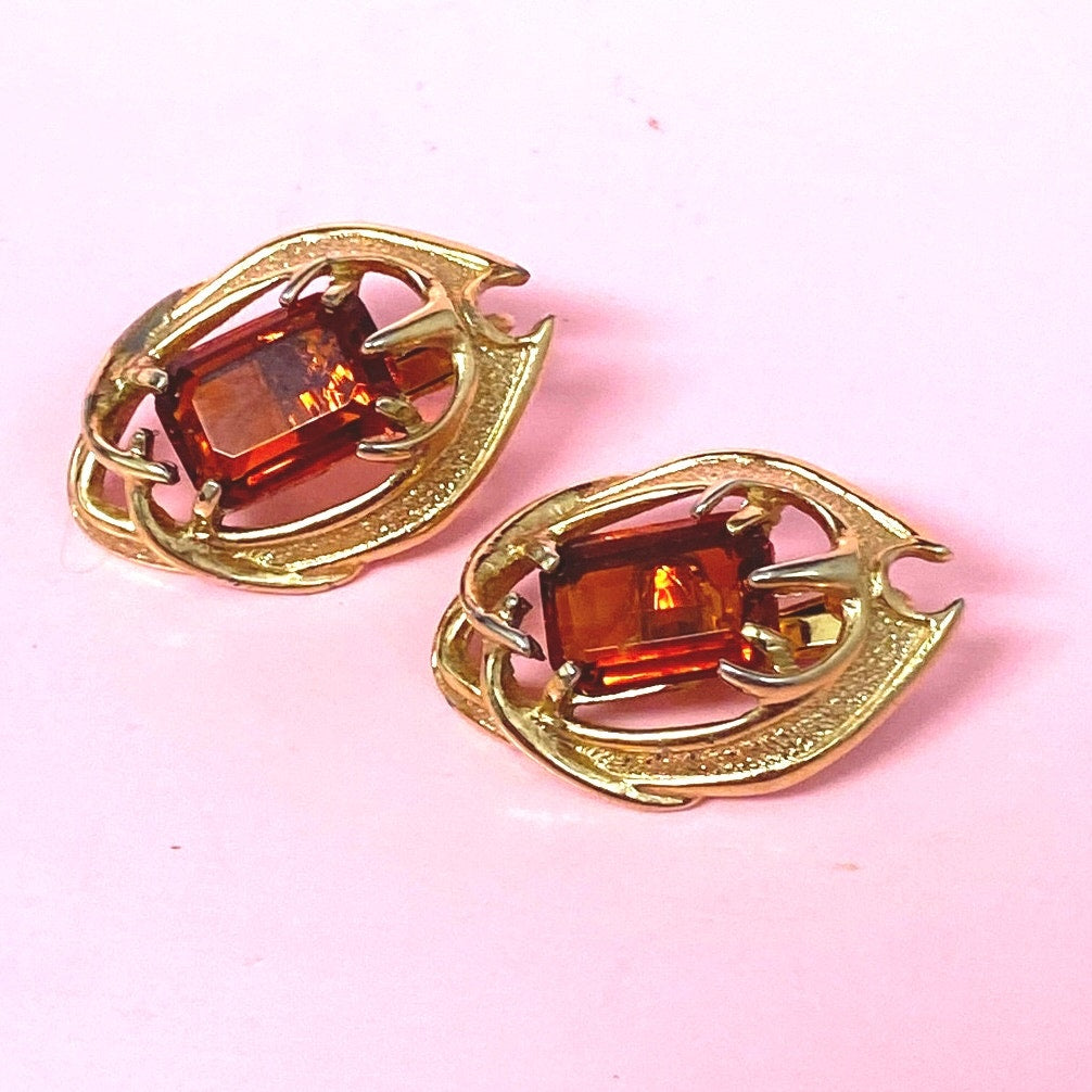 Sarah Coventry Clip On Earrings on Amber Glass