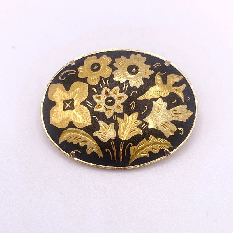 Vintage Damascene Brooch featuring Floral Motifs