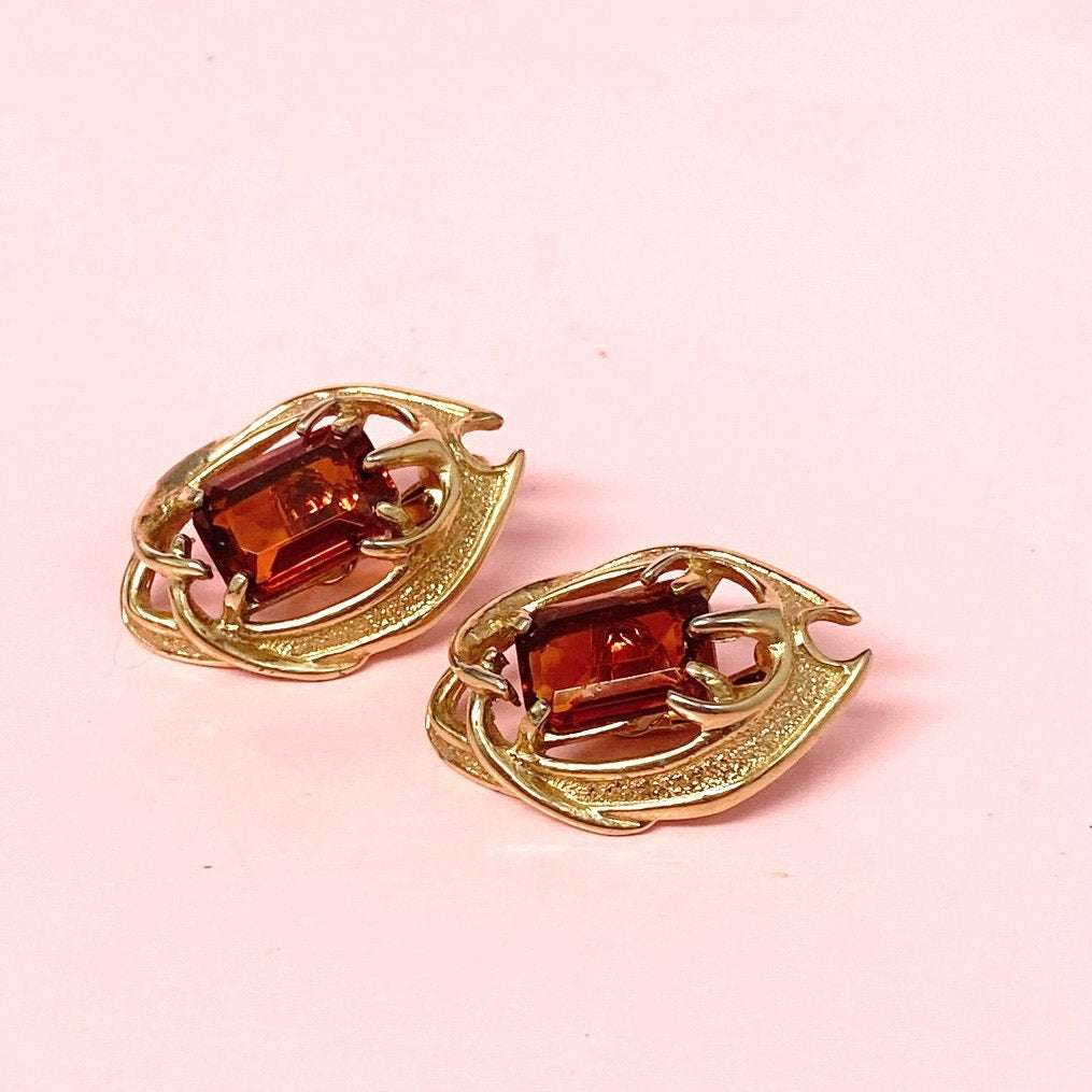 Sarah Coventry Clip On Earrings on Amber Glass