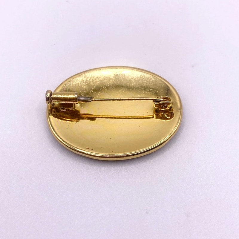 Vintage Damascene Brooch featuring Floral Motifs