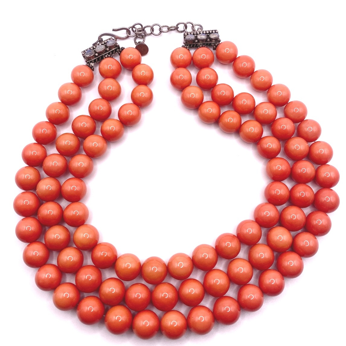 Bohemian Glass in Orange Coral Tone Coated with Sterling and moonstone closure