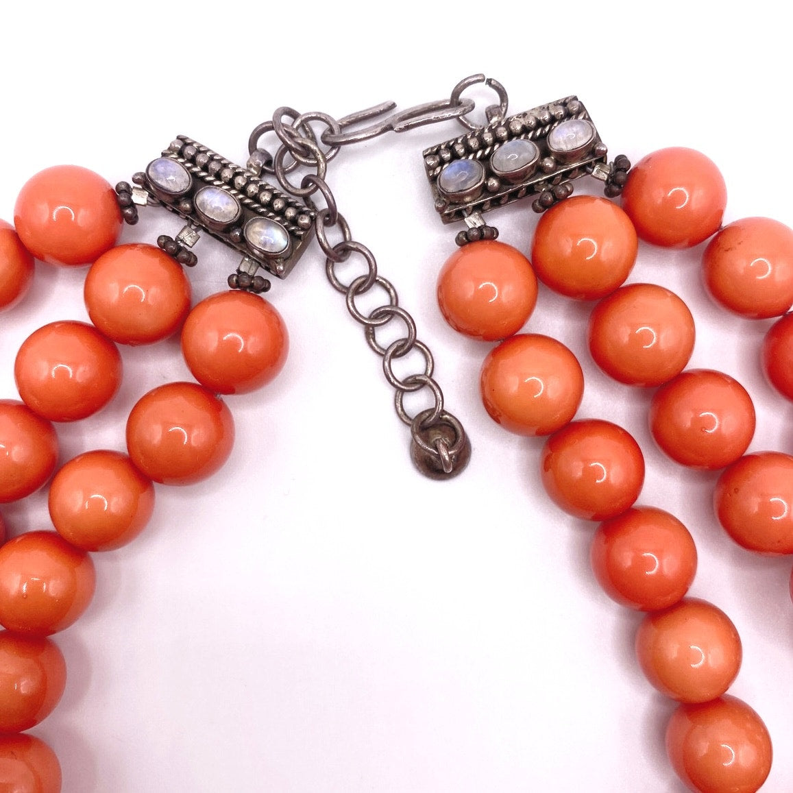Bohemian Glass in Orange Coral Tone Coated with Sterling and moonstone closure